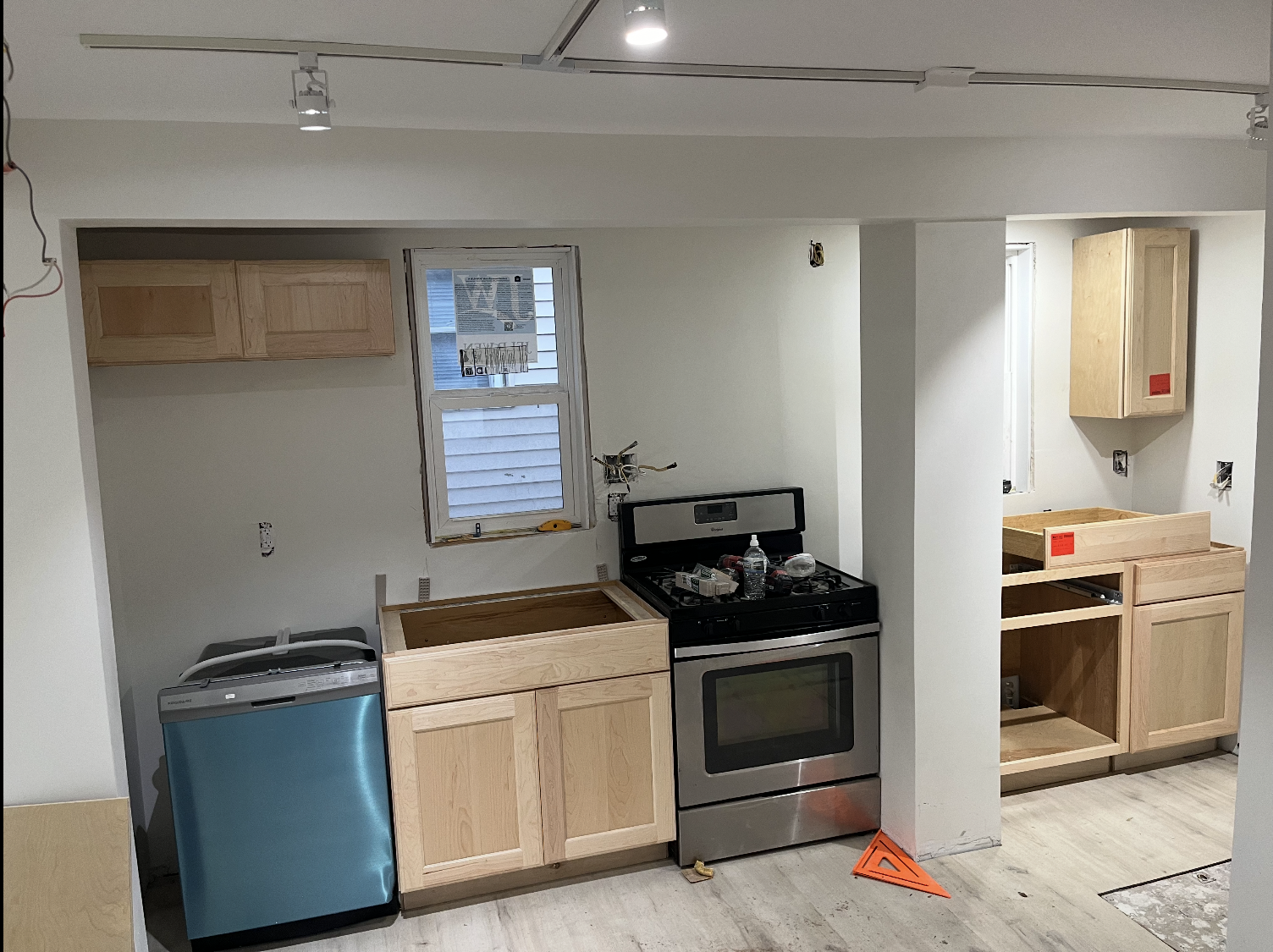 Cabinet installation and kitchen build-out work