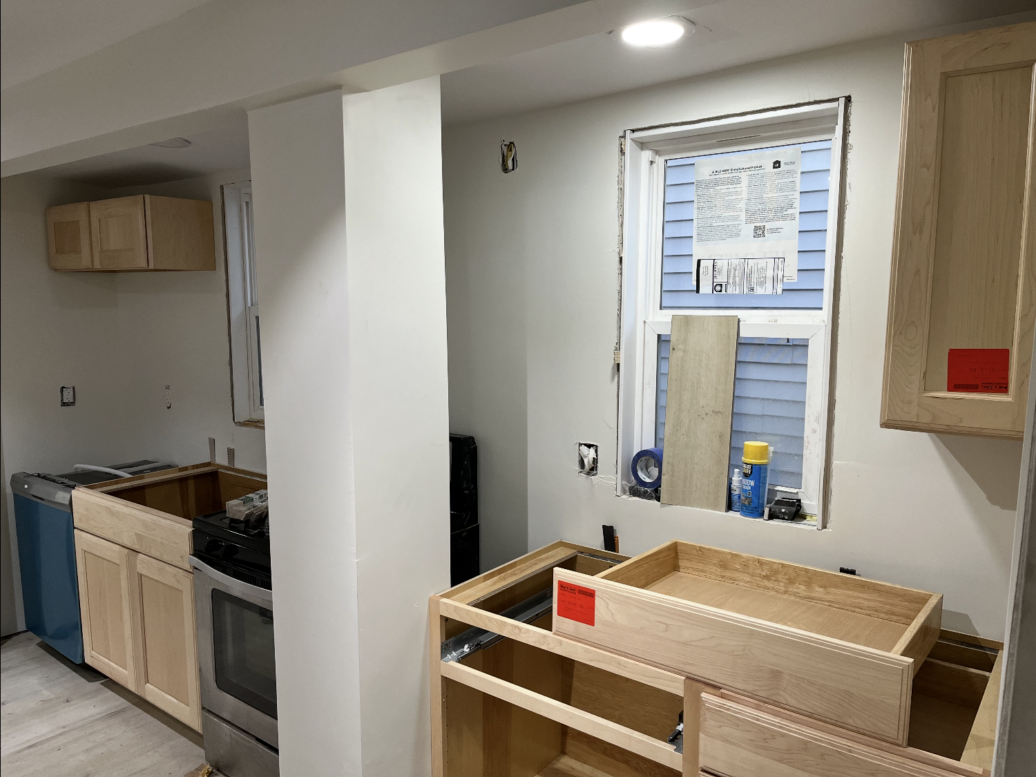 Additional cabinet installation and room finish progress