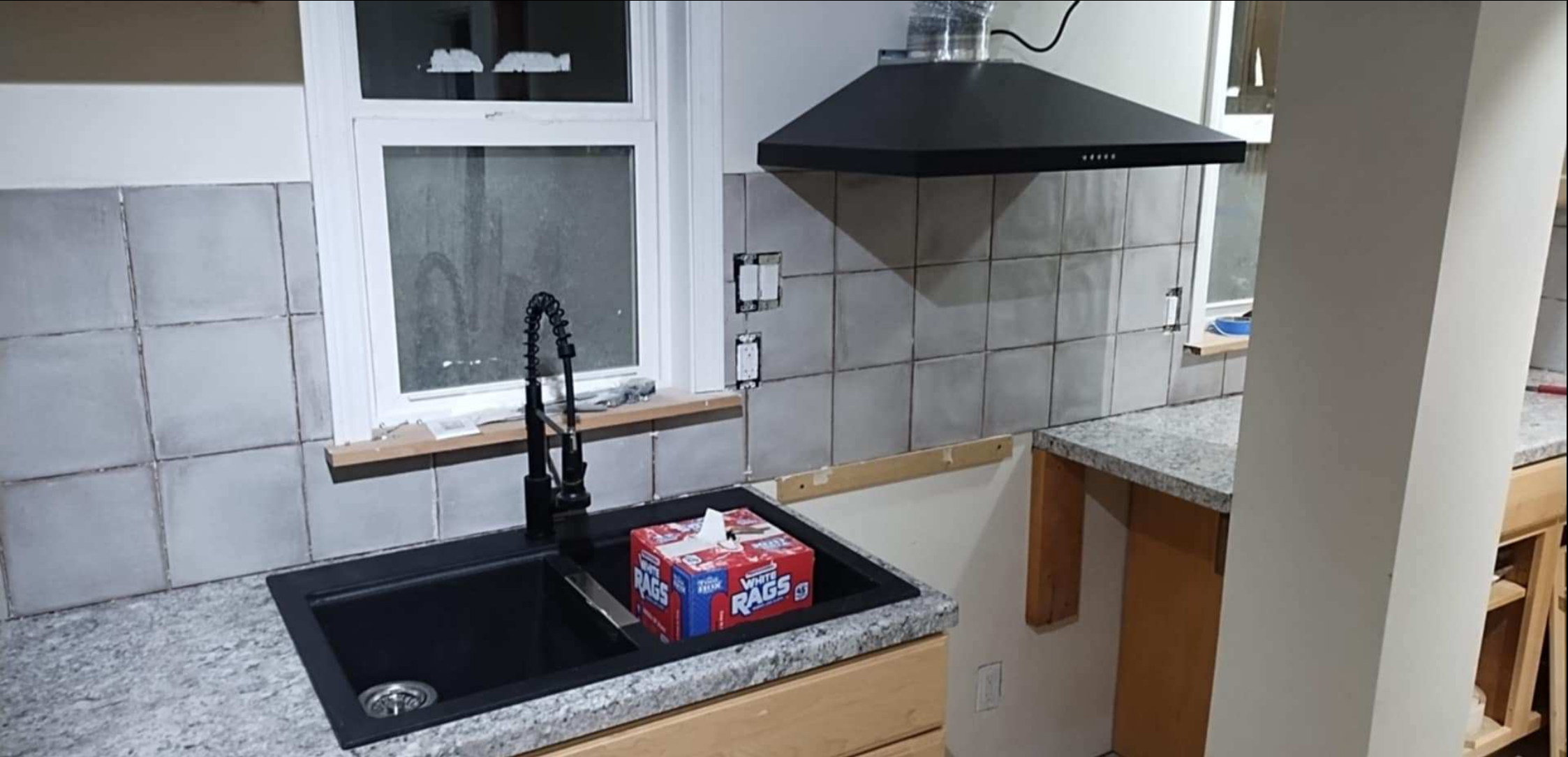 Kitchen sink area installation and finish work