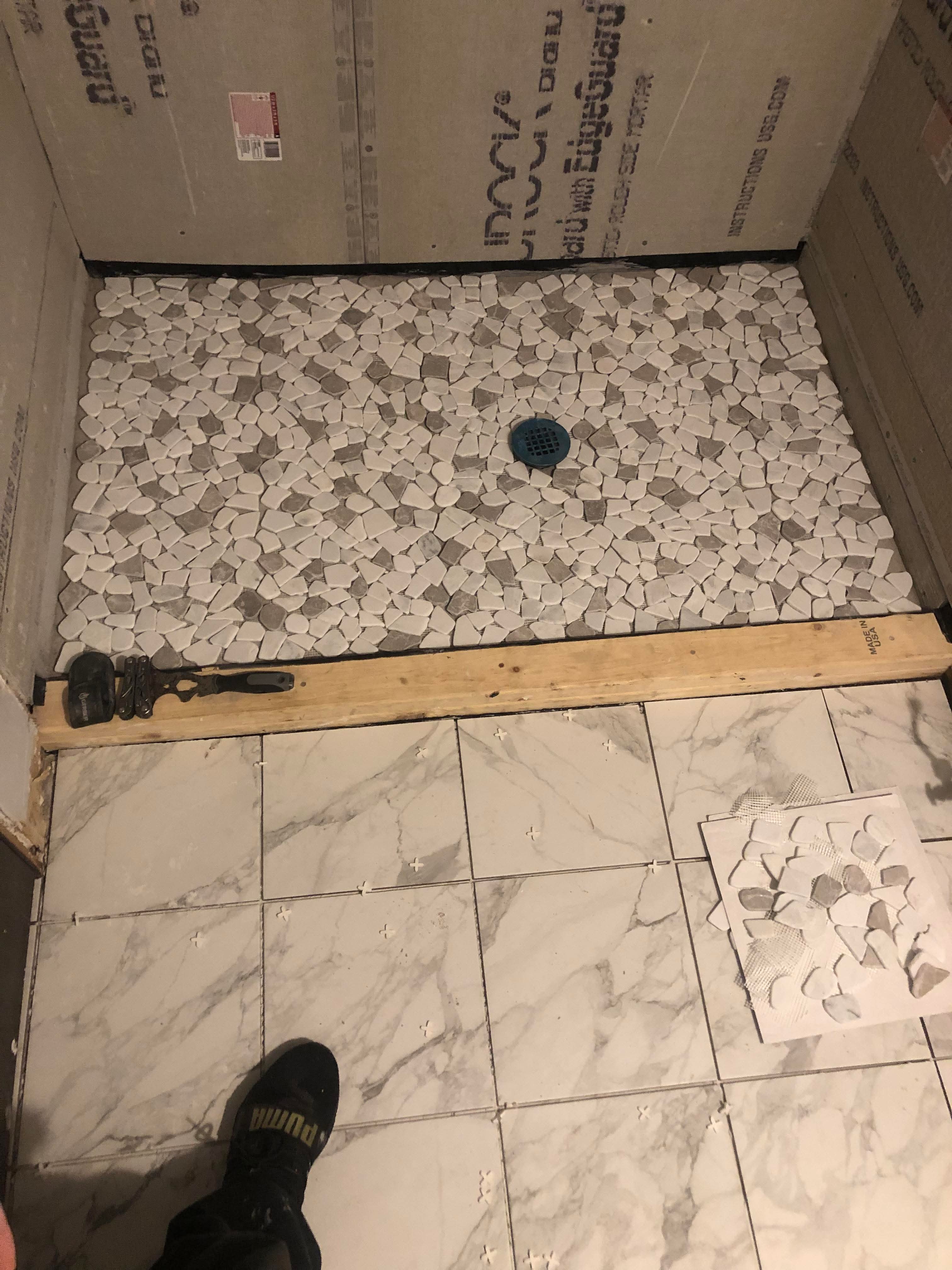 Shower pan installation and bathroom floor prep